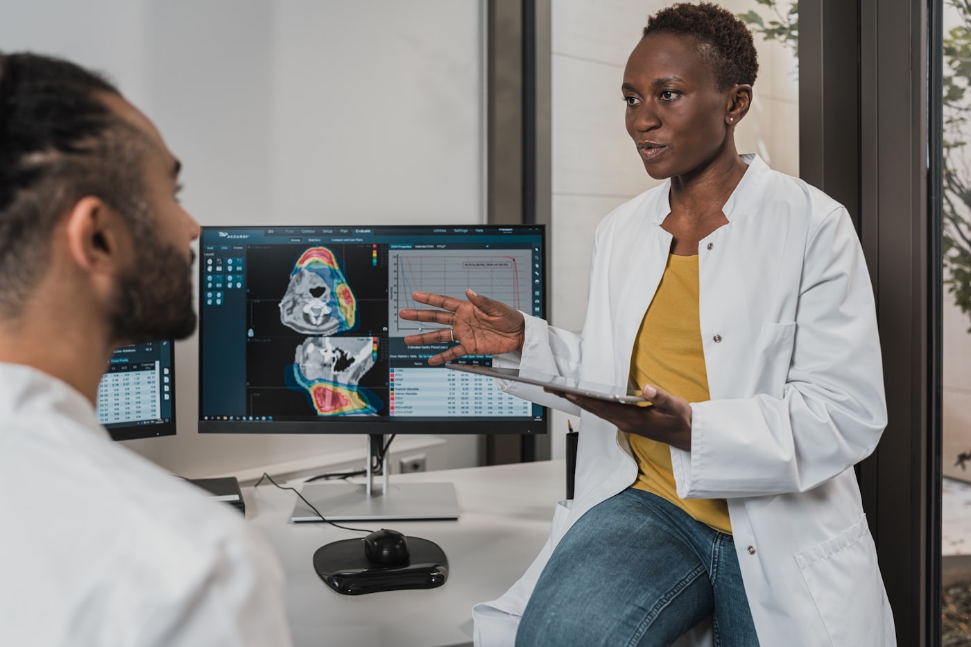 Clinical team verifying healthcare compliance records