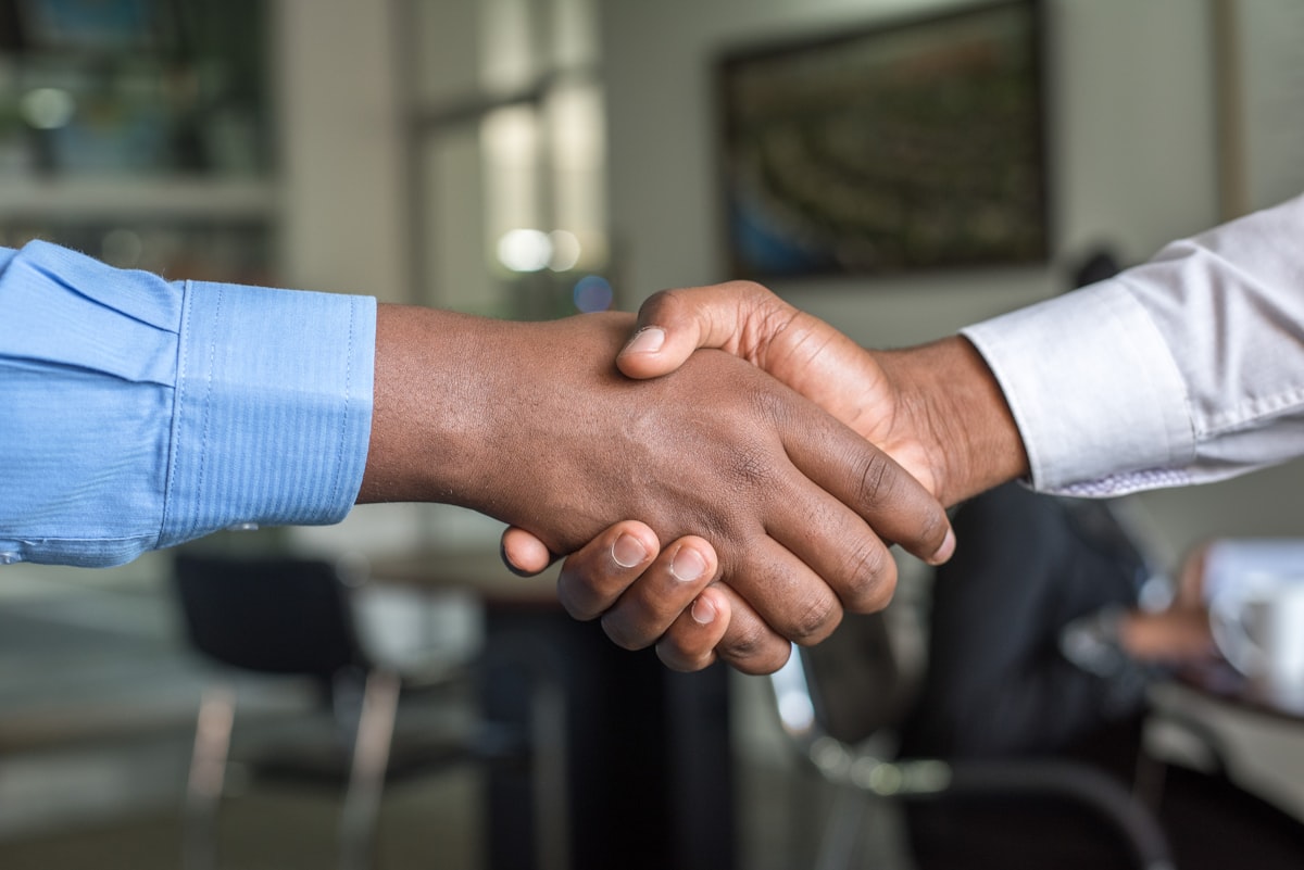 Partnership handshake between organizations